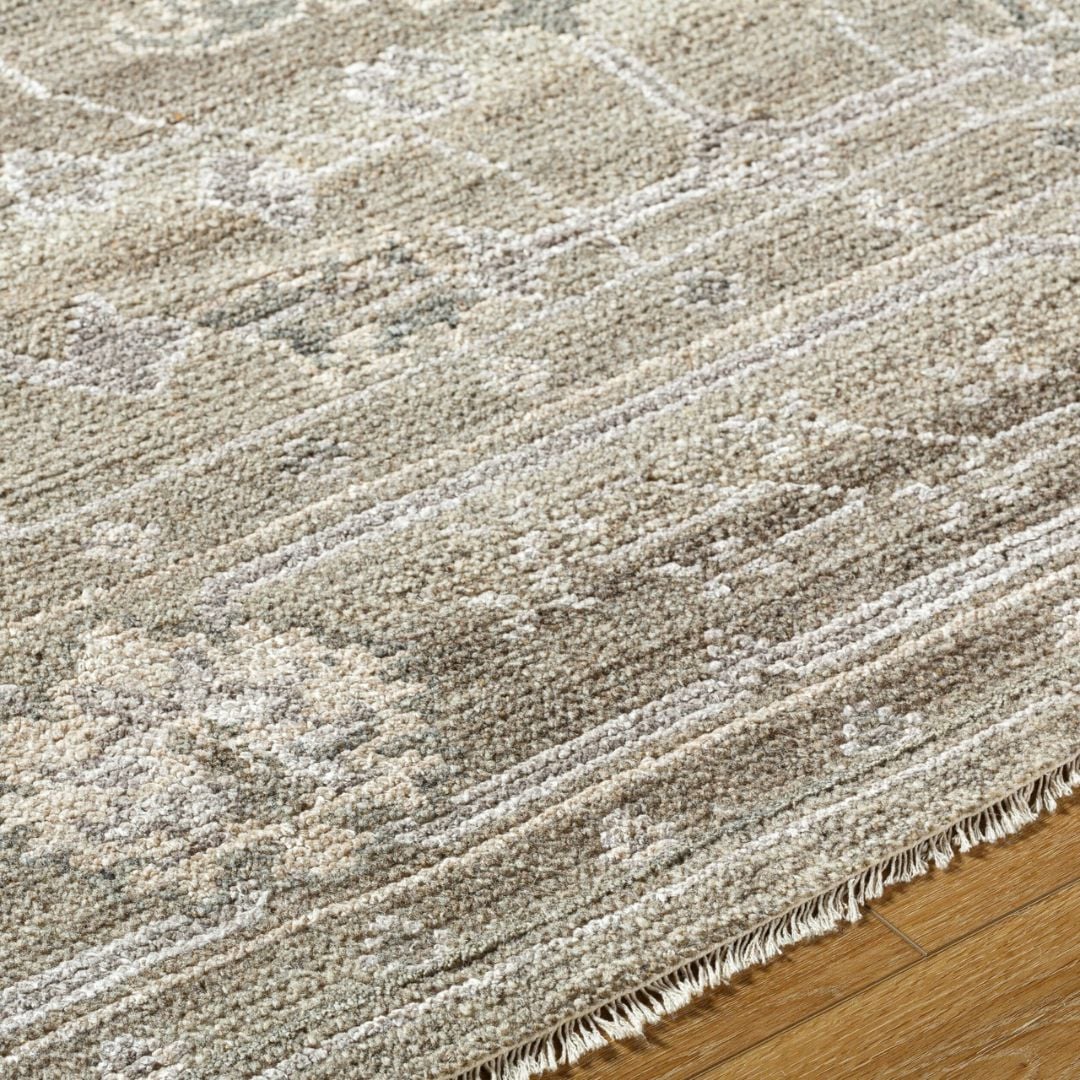Close up of Almeria rug texture showing hand-knotted wool and viscose blend with subtle sheen