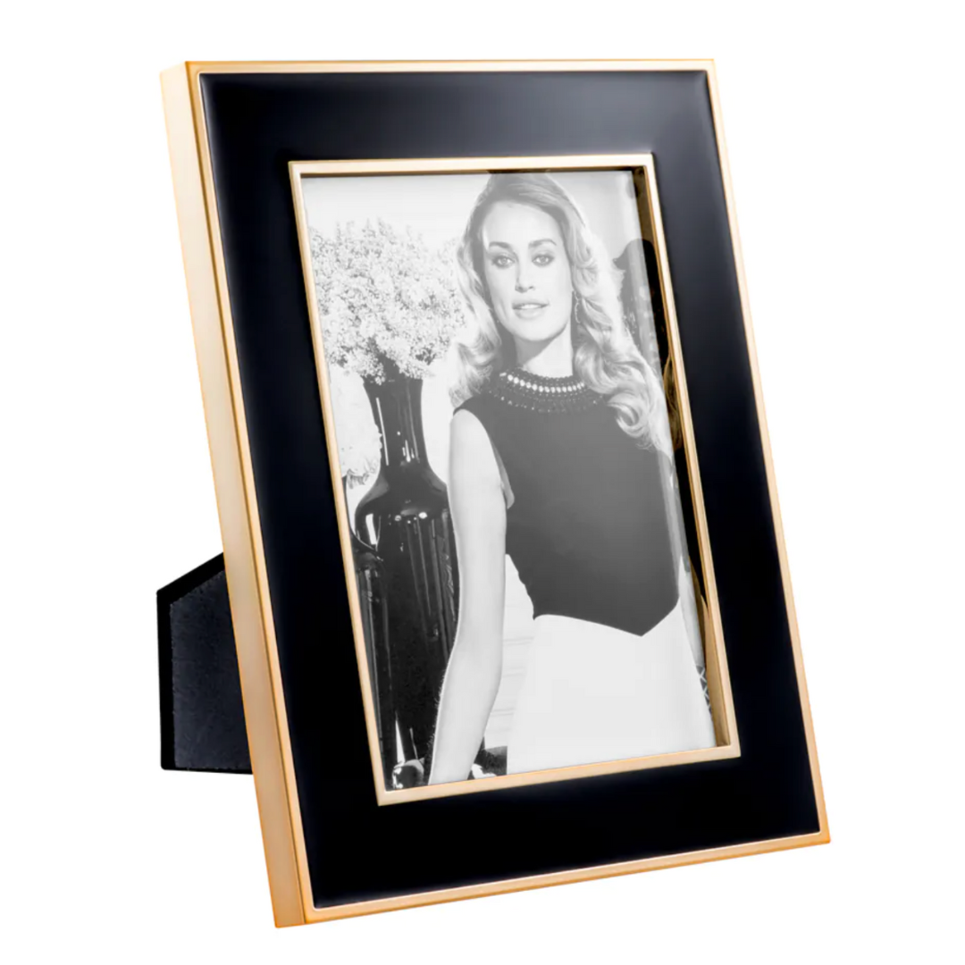 Eichholtz black picture frame with gold edges on a white background, perfect for modern and luxe interiors.