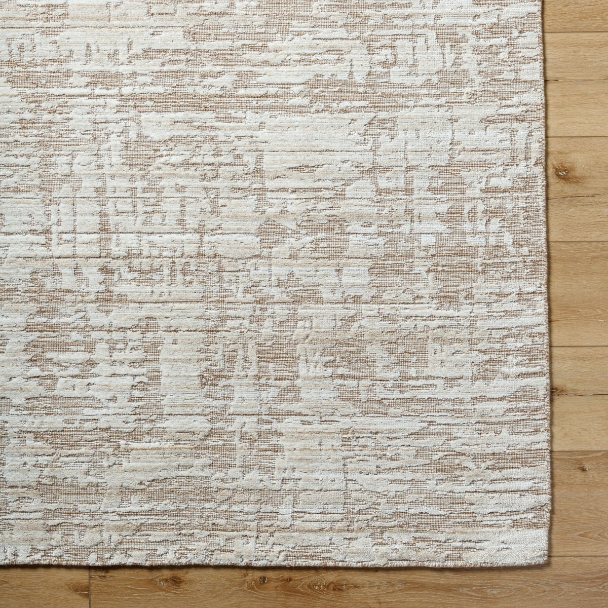 Edge detail of Keiichi Jackie rug highlighting low 0.7 cm pile and artisan hand-loomed finish