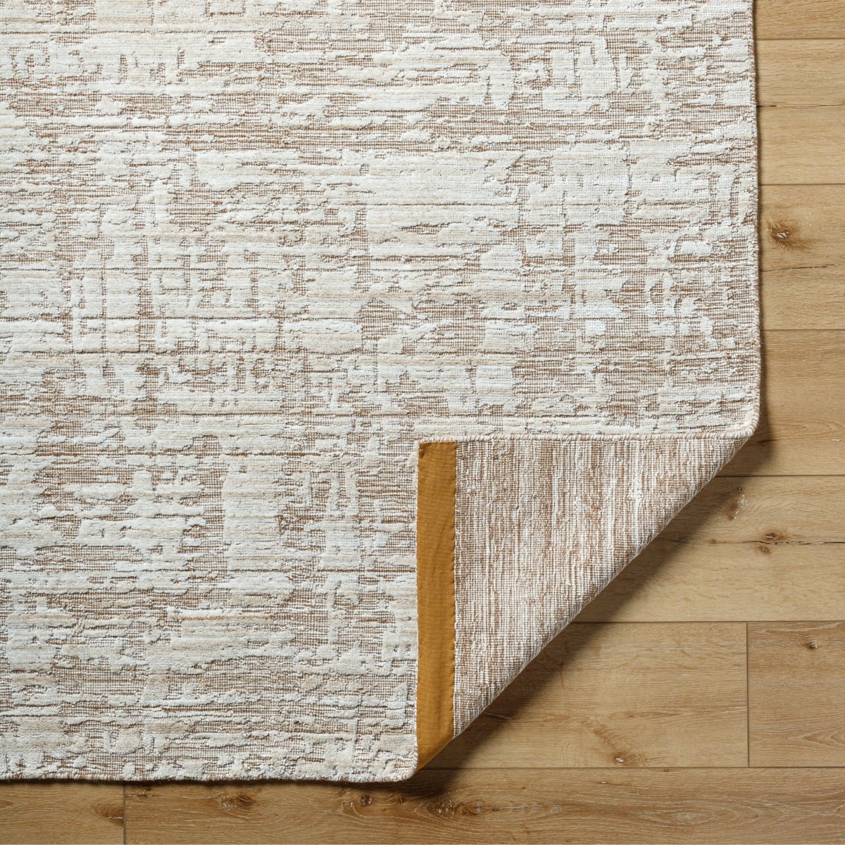 Edge detail of Keiichi Jackie rug highlighting low 0.7 cm pile and artisan hand-loomed finish