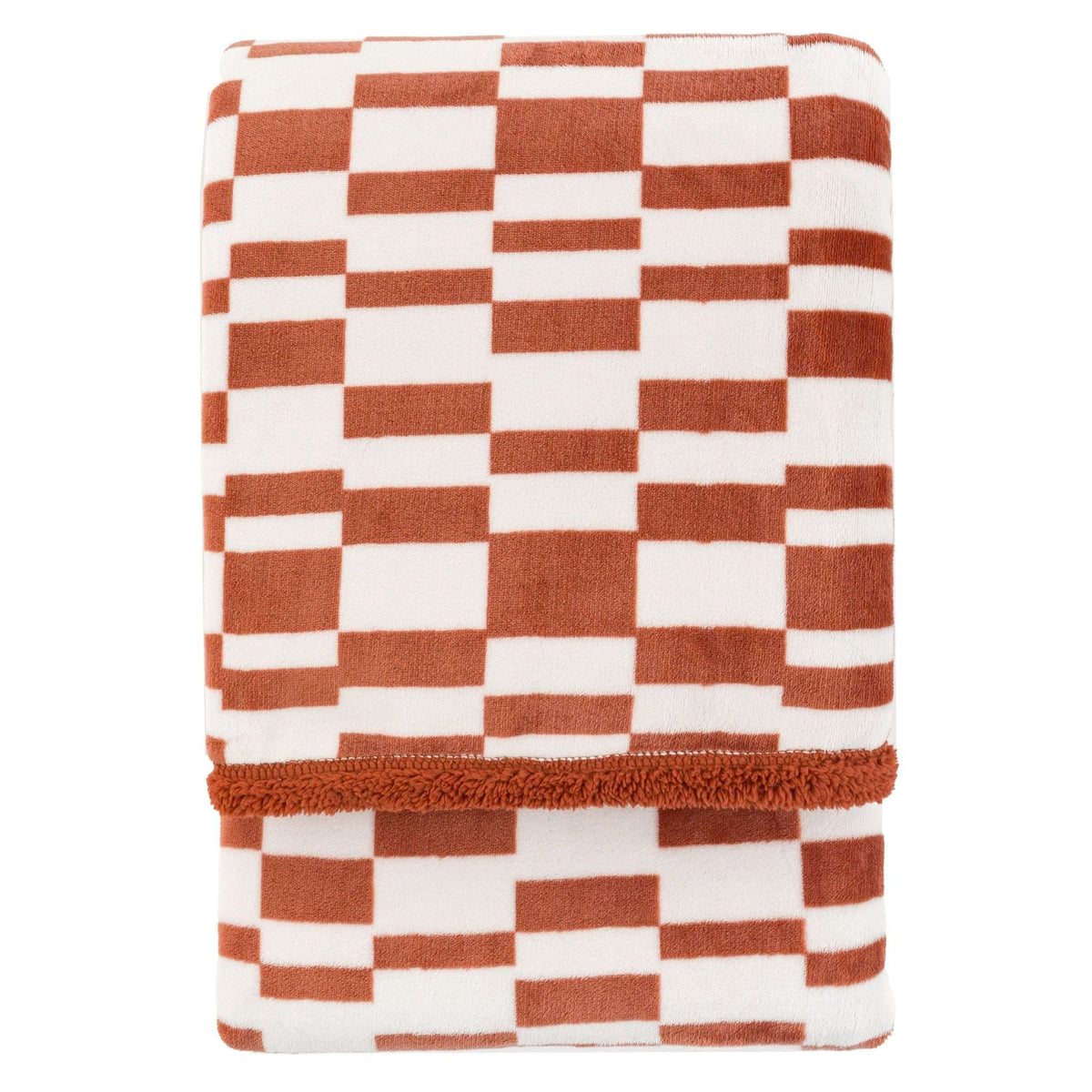 Folded rust and cream geometric patterned throw blanket with plush sherpa trim, modern cosy home accessory.