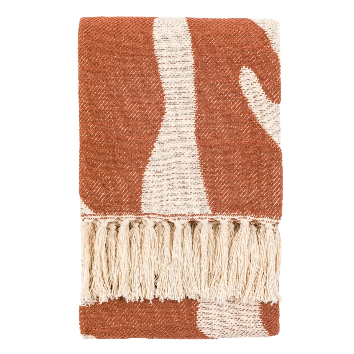 Folded rust and cream throw blanket with tassel edging on white background.