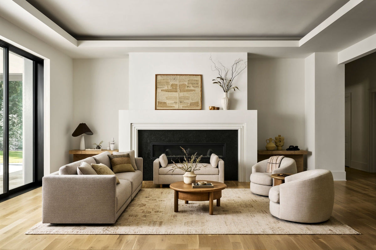 Neutral Cannes hand-knotted rug 305 x 244 cm styled in a modern living room beneath sofa and coffee table