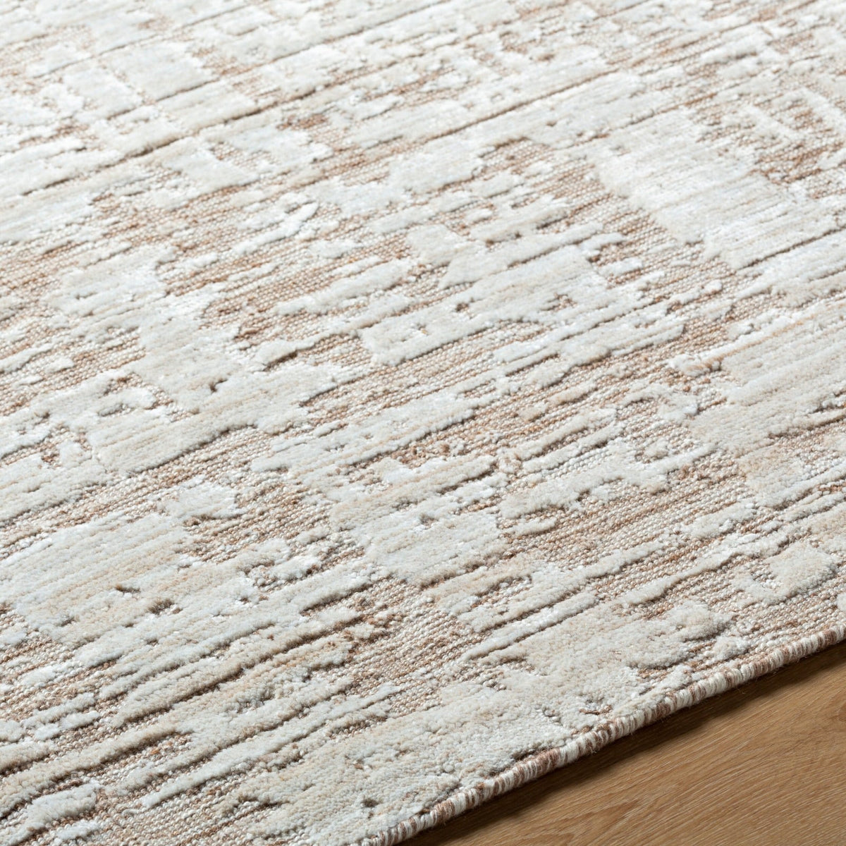 Close up of Jackie rug texture showing hand-loomed weave in viscose and wool blend with subtle sheen