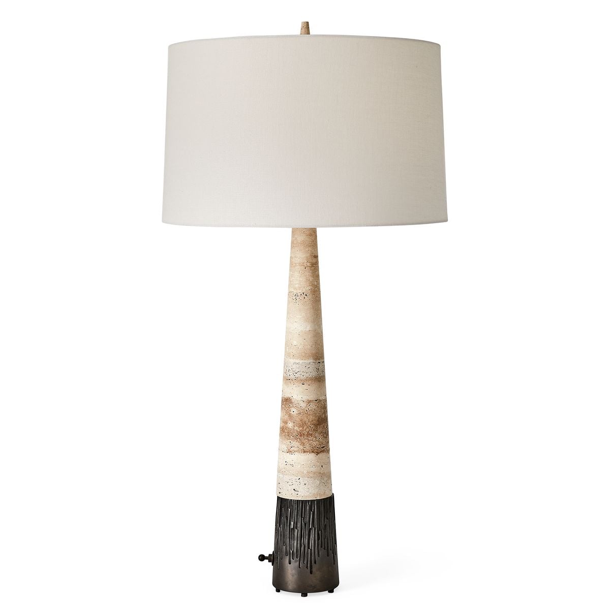 A travertine stone base table lamp sat on a cast brass base in bronze finish